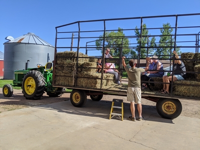 Tractor and hay wagon ride at CSA event at SCF in Bloomer, WI