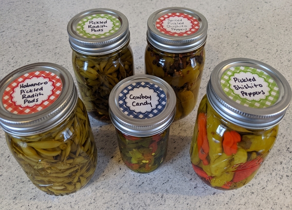 Jars of pickles, jam and jelly made with produce from the farm